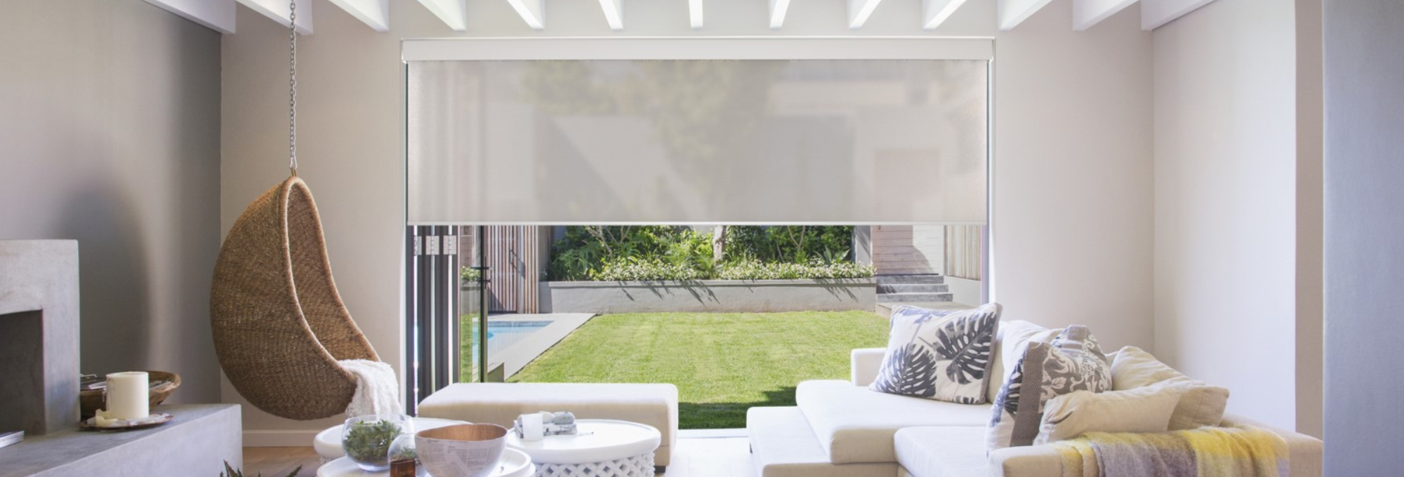 Modern home with roller shade by Royalty Window Coverings & More